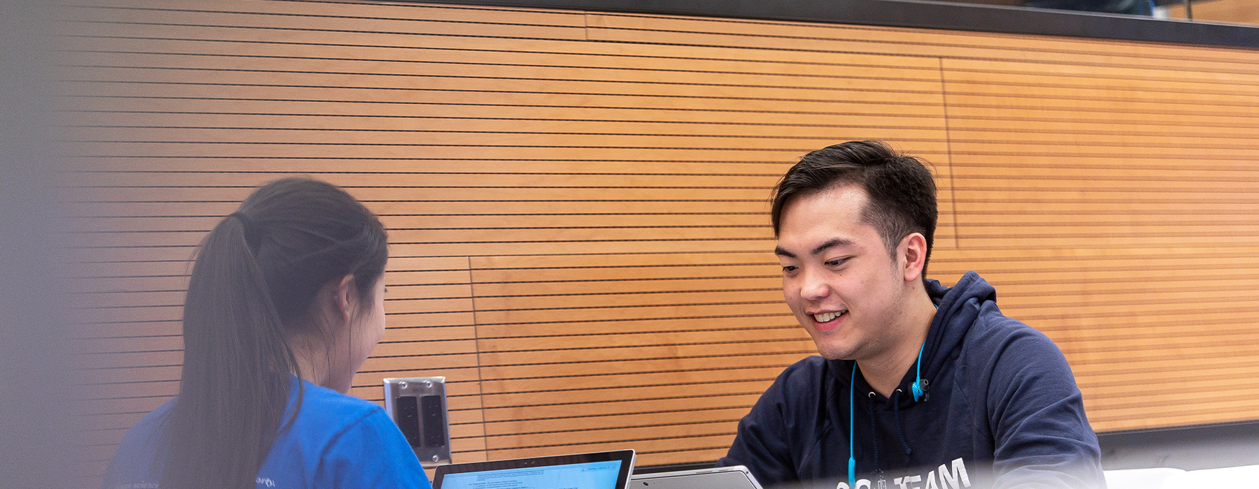 Two students studying at a desk
