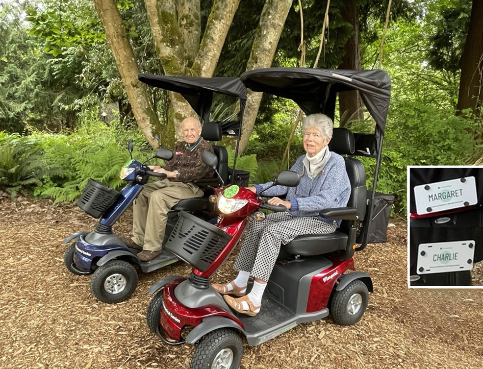 Margaret and Charlie on scooters