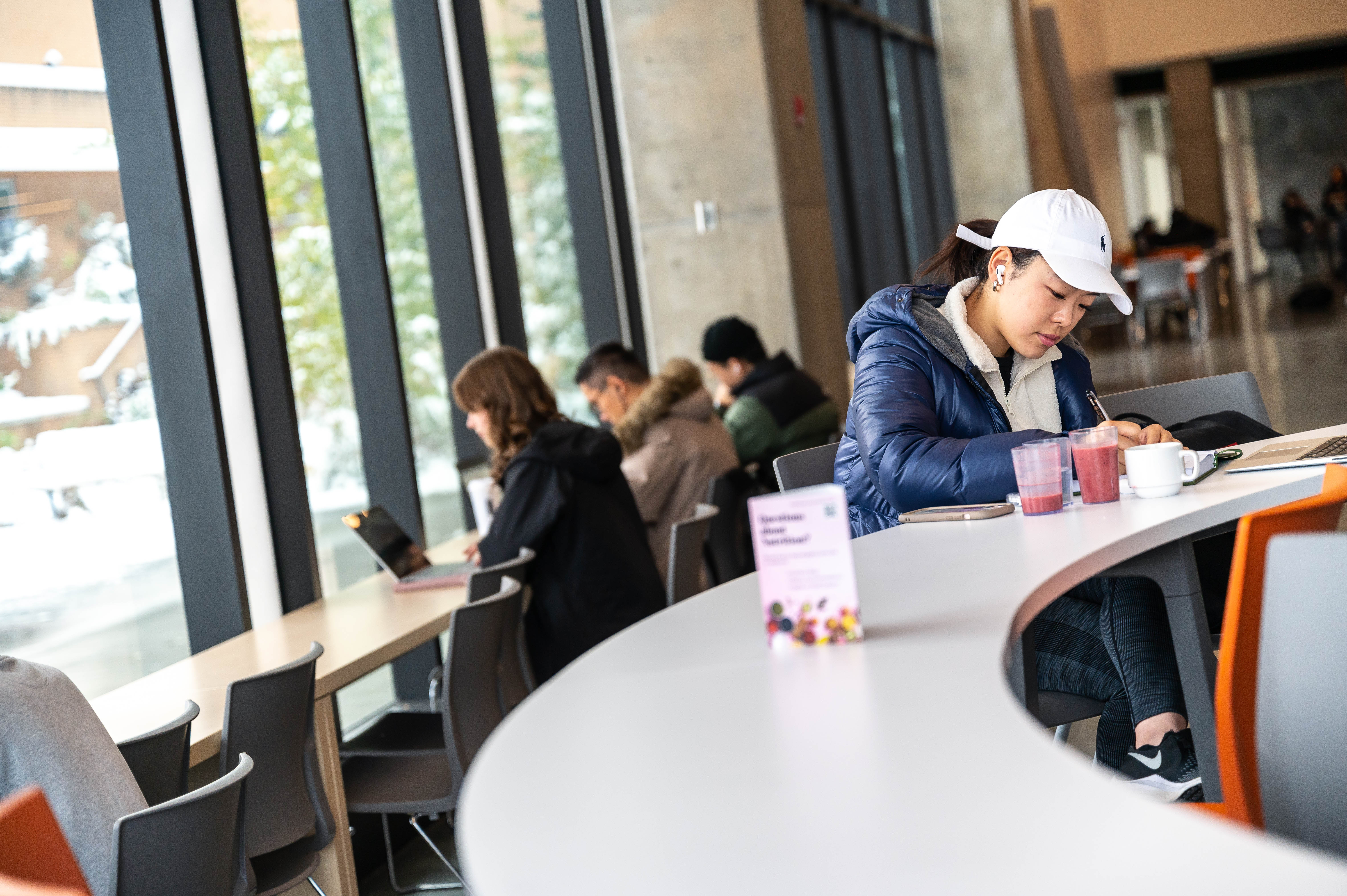 Student studying at a cafe