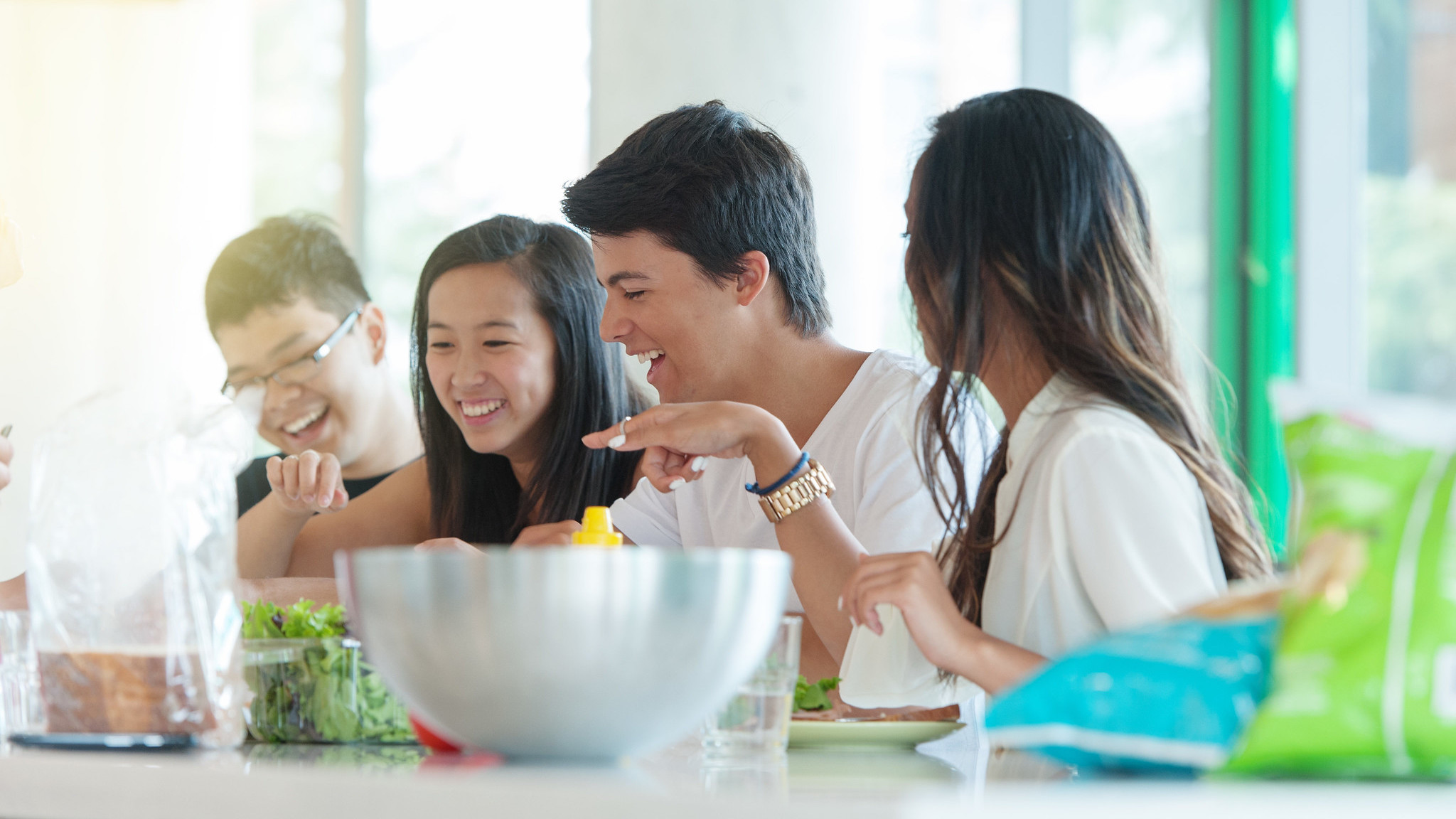 Students making a salad together.