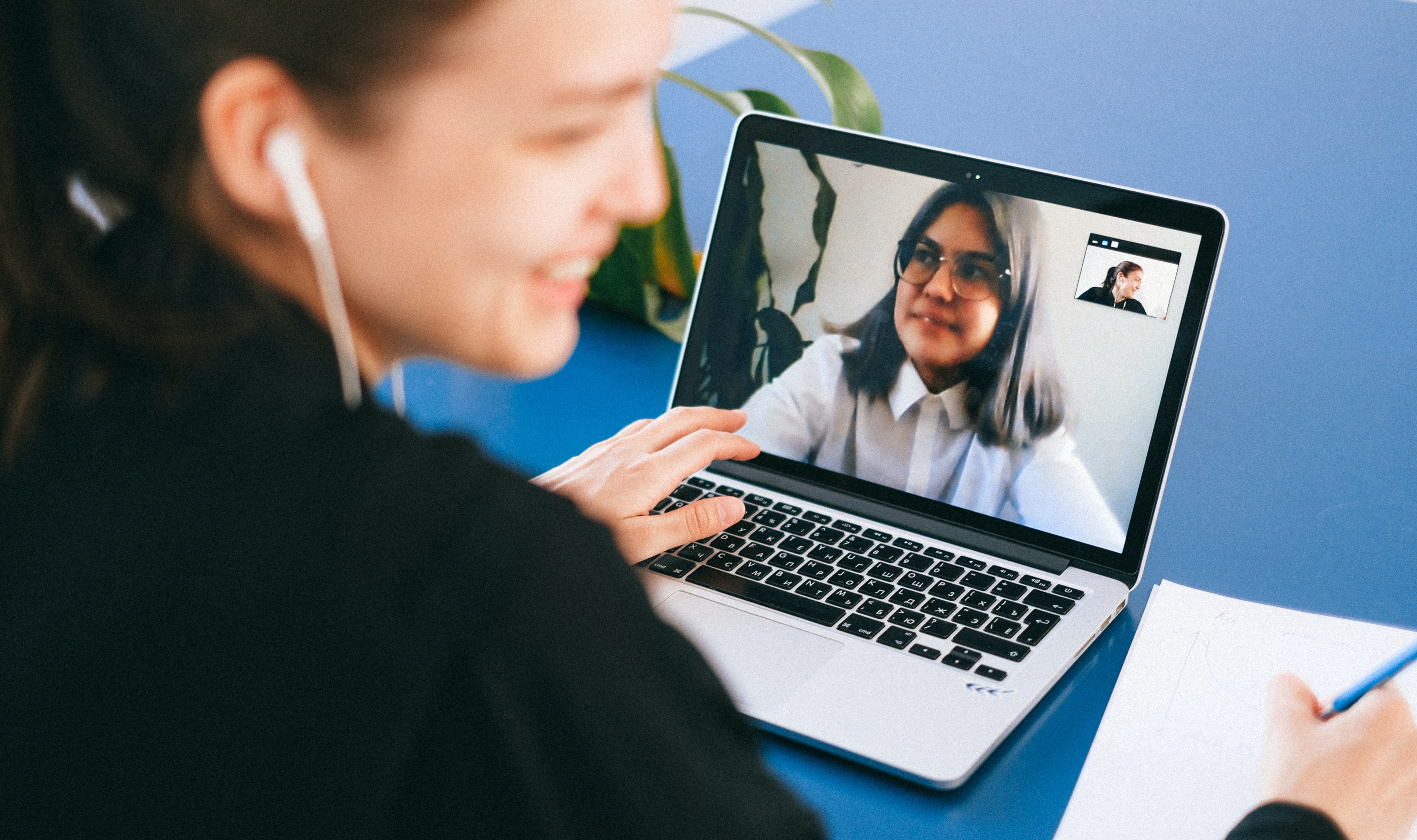 A photo of a woman in a Zoom meeting.