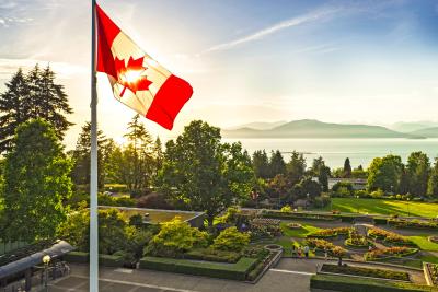 View of mountains and Canadian flag