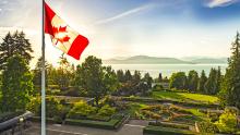 View of mountains and Canadian flag