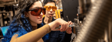 Two people researching in a lab