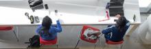 Birds-eye view of students studying at a desk