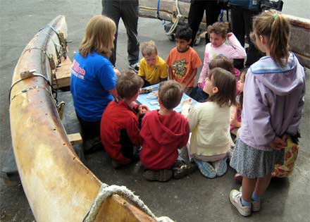 Environmental educator Natalie Bowes teaches students from Frank Hobbs Elementary about whale feeding. Photo: Derek Tan.
