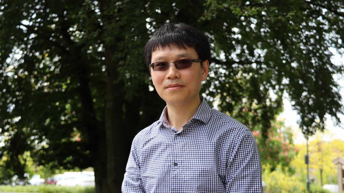 Headshot of Prof. Jiarui Ding