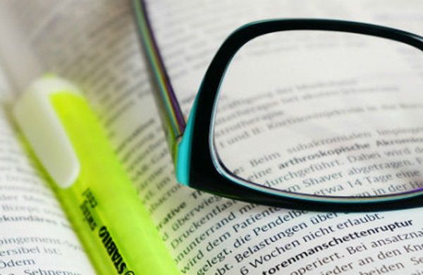 Glasses on book